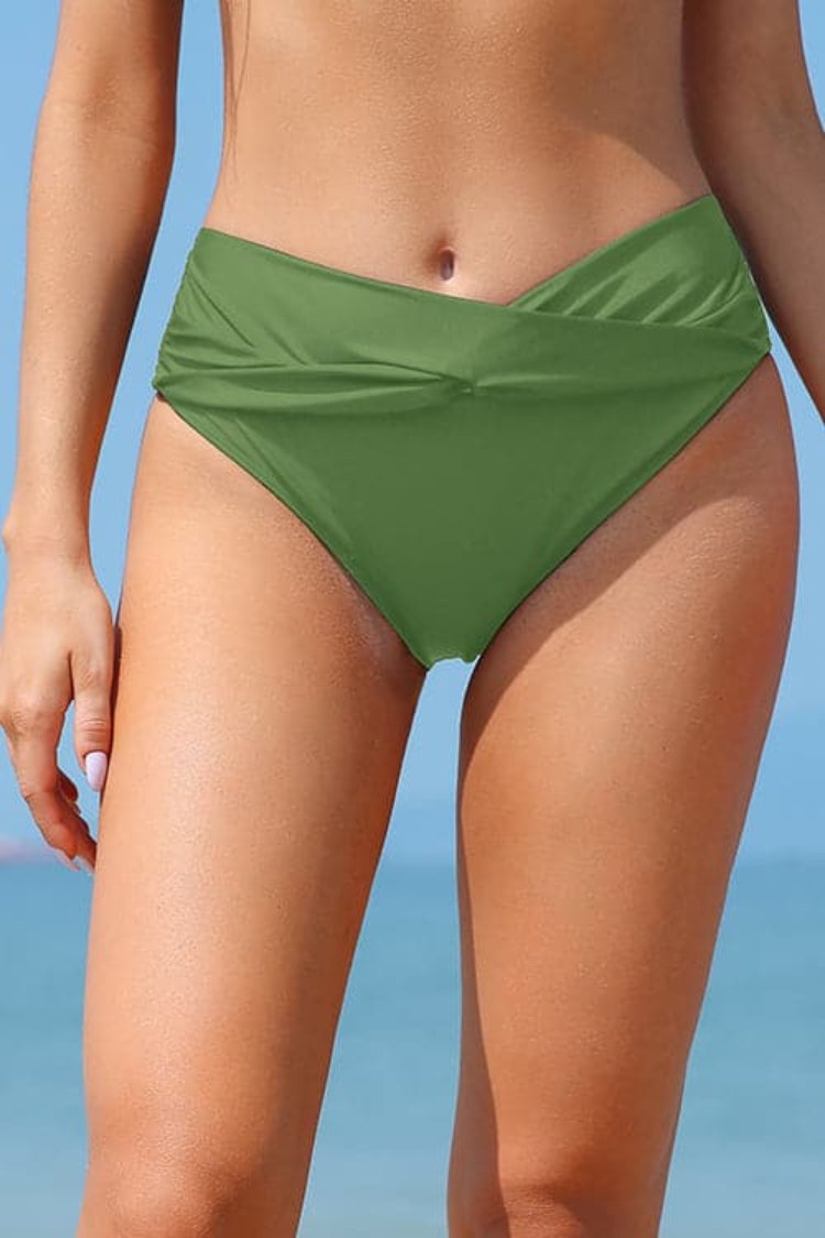 Shekini Twist Twist Bas de bikini solide à la taille moyenne