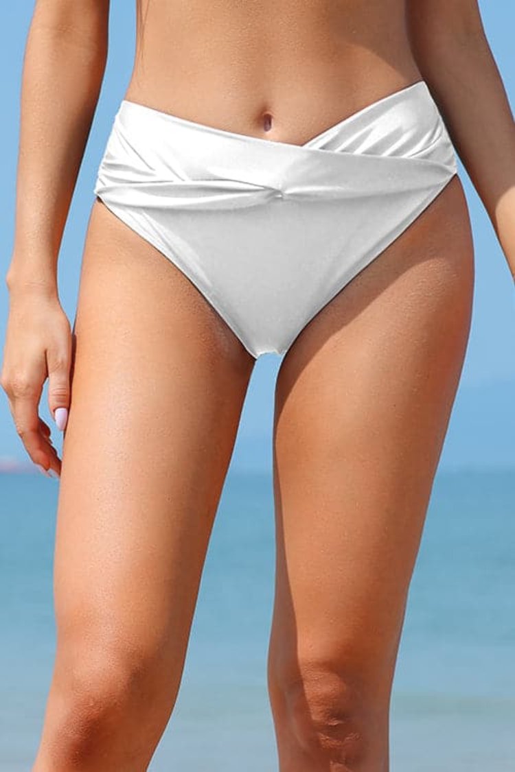 Shekini Twist Twist Bas de bikini solide à la taille moyenne